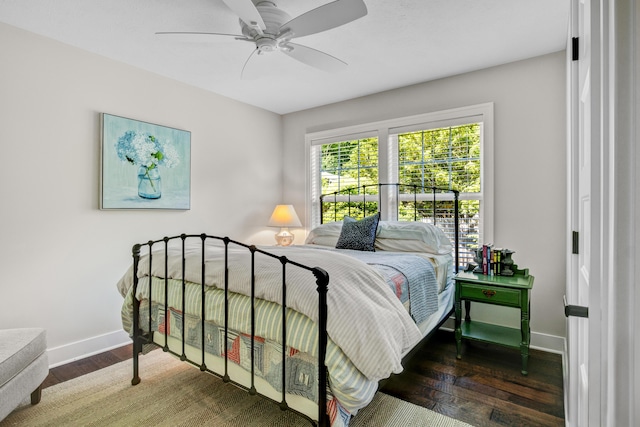 283 Wiley Rd, Douglas, MI 49406 - bedroom featuring baseboards, wood finished floors, and ceiling fan