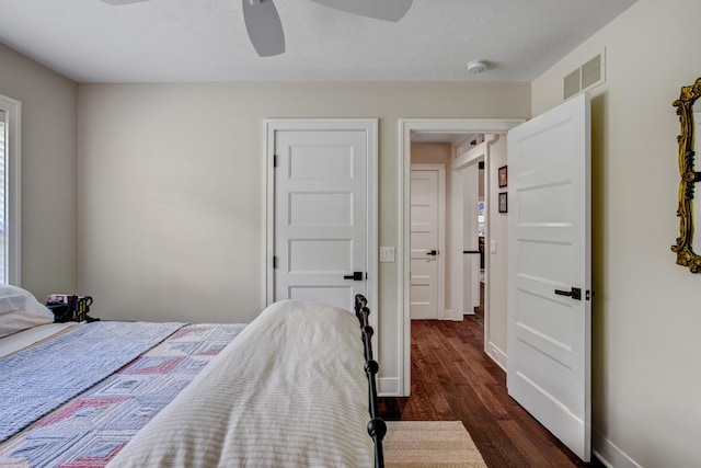 283 Wiley Rd, Douglas, MI 49406 - bedroom featuring dark wood-type flooring, ceiling fan, and baseboards