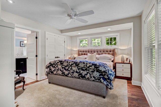 283 Wiley Rd, Douglas, MI 49406 - bedroom with dark wood-style floors, recessed lighting, baseboards, ceiling fan, and ensuite bath