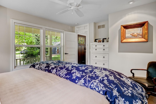 283 Wiley Rd, Douglas, MI 49406 - bedroom with multiple windows and ceiling fan
