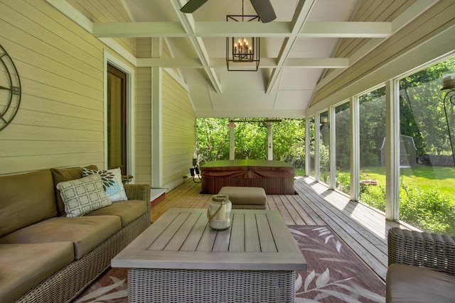 283 Wiley Rd, Douglas, MI 49406 - sunroom / solarium featuring a jacuzzi, outdoor lounge area, a ceiling fan, a chandelier, and beamed ceiling