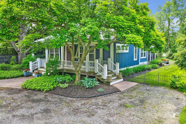 283 Wiley Rd, Douglas, MI 49406 - obstructed view of property featuring covered porch