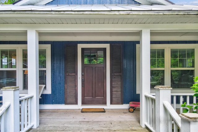 283 Wiley Rd, Douglas, MI 49406 - entrance to property with board and batten siding and a porch