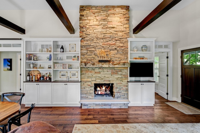 283 Wiley Rd, Douglas, MI 49406 - living area featuring dark wood-style flooring and a stone fireplace