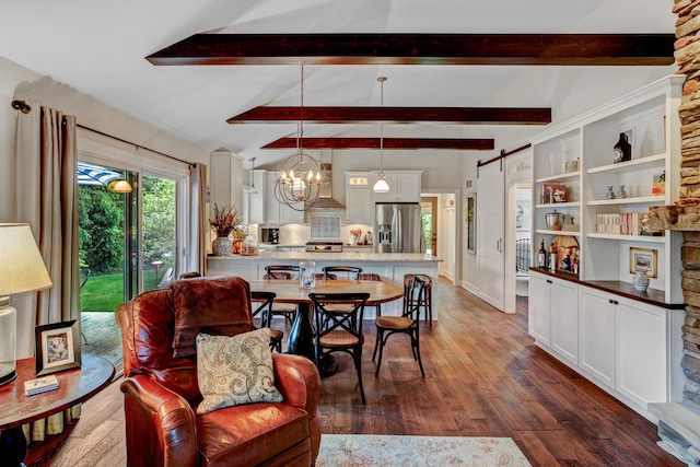 283 Wiley Rd, Douglas, MI 49406 - dining room with dark wood-style floors, a chandelier, and a barn door