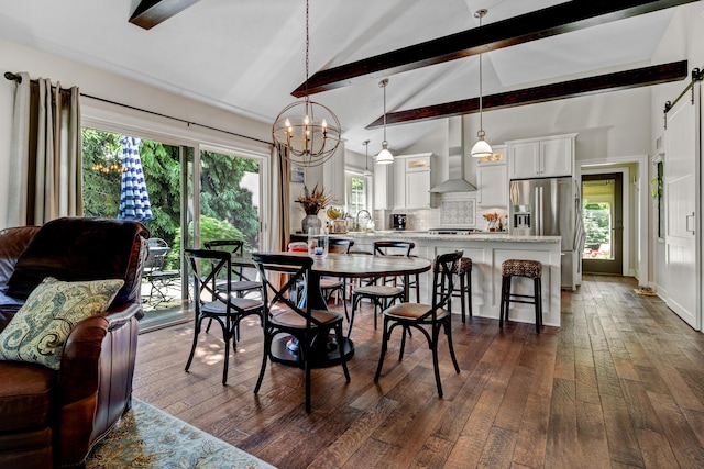 283 Wiley Rd, Douglas, MI 49406 - dining area with a chandelier and dark wood-style floors
