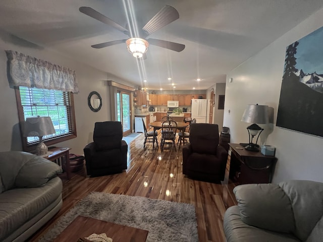 12050 S Ponderosa, Sand Lake, MI 49343 - living area featuring wood finished floors and a ceiling fan