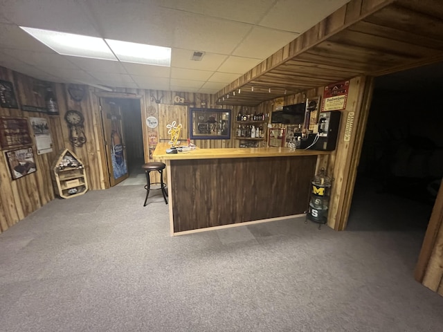 12050 S Ponderosa, Sand Lake, MI 49343 - indoor bar with carpet floors, wood walls, and a drop ceiling