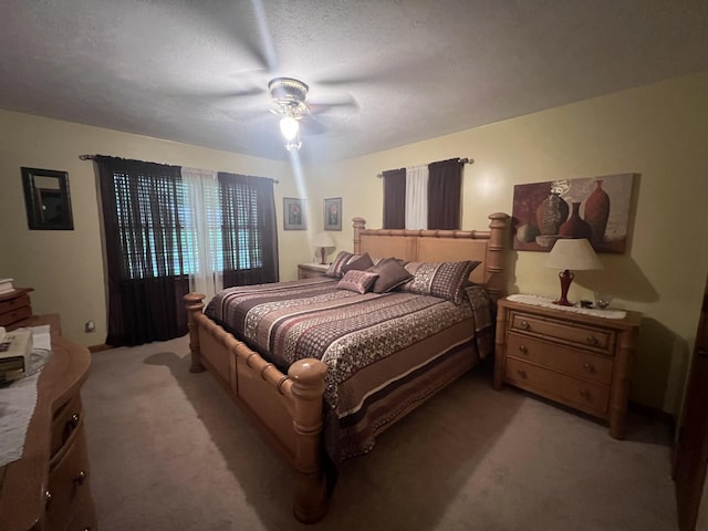 12050 S Ponderosa, Sand Lake, MI 49343 - bedroom featuring light carpet and ceiling fan