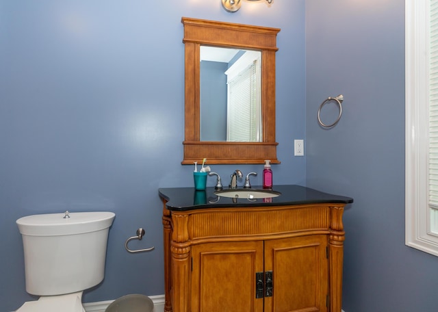 10543 Lakeshore Dr, West Olive, MI 49460 - half bath featuring toilet and vanity