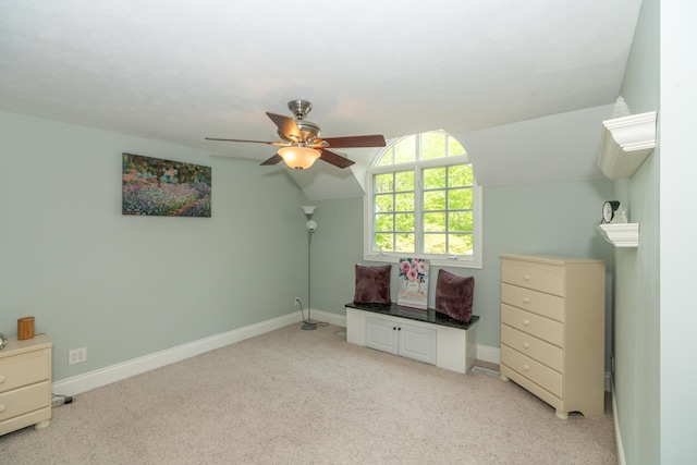10543 Lakeshore Dr, West Olive, MI 49460 - unfurnished bedroom featuring light carpet, vaulted ceiling, baseboards, and a ceiling fan