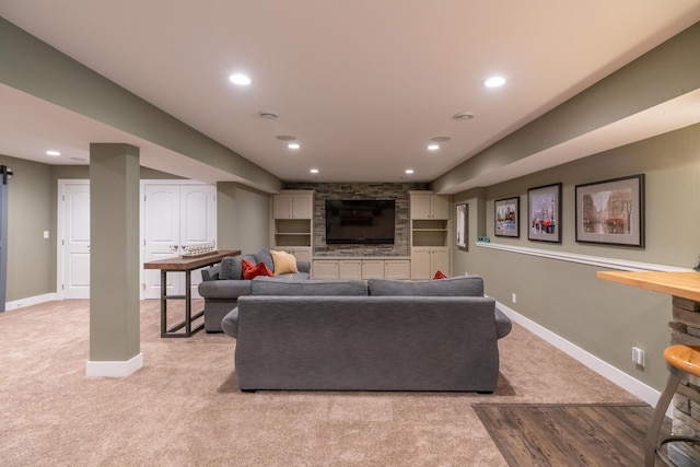10543 Lakeshore Dr, West Olive, MI 49460 - living area with baseboards, light carpet, recessed lighting, and a fireplace