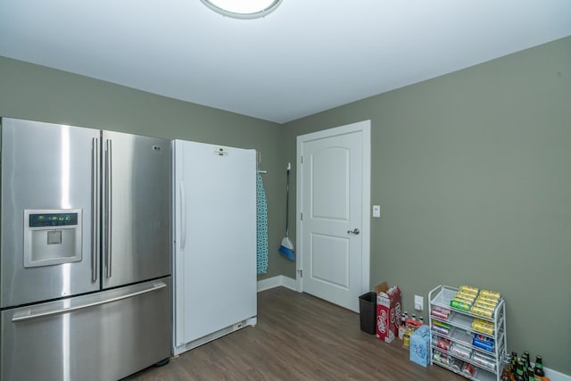 10543 Lakeshore Dr, West Olive, MI 49460 - kitchen featuring stainless steel fridge and wood finished floors