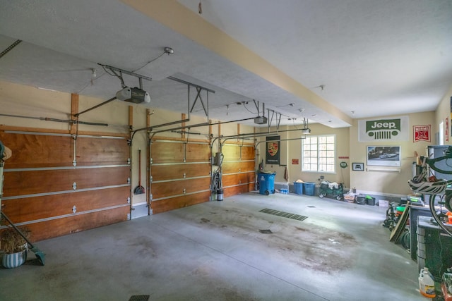 10543 Lakeshore Dr, West Olive, MI 49460 - garage featuring a garage door opener
