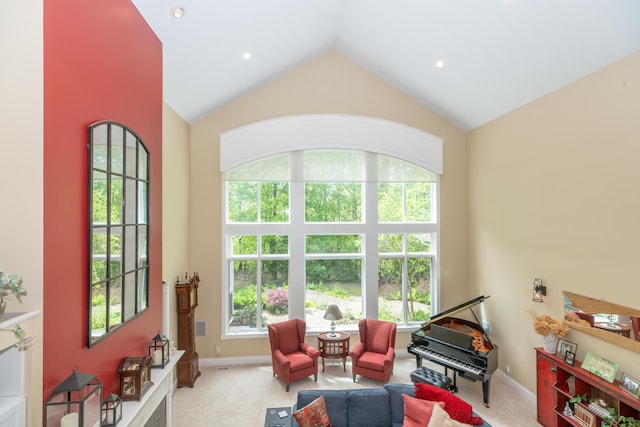 10543 Lakeshore Dr, West Olive, MI 49460 - carpeted living area with lofted ceiling, baseboards, and recessed lighting
