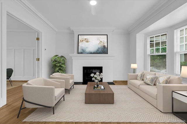 756 Delaware St, Detroit, MI 48202 - living room with crown molding, wood finished floors, and a fireplace