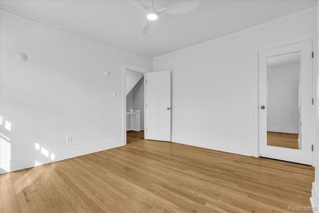 756 Delaware St, Detroit, MI 48202 - unfurnished bedroom with light wood-type flooring, crown molding, ceiling fan, and baseboards
