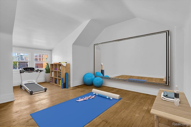 756 Delaware St, Detroit, MI 48202 - workout area with lofted ceiling, wood finished floors, and baseboards