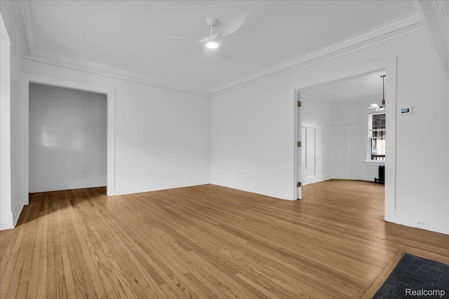 756 Delaware St, Detroit, MI 48202 - spare room featuring ceiling fan, light wood-style floors, and ornamental molding