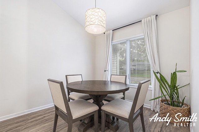 319 Nestlewood Dr Unit 3, Holland, MI 49424 - dining area featuring wood finished floors and baseboards