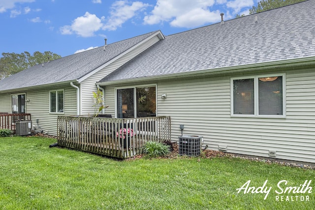 319 Nestlewood Dr Unit 3, Holland, MI 49424 - back of property featuring a shingled roof, a deck, crawl space, a yard, and cooling unit
