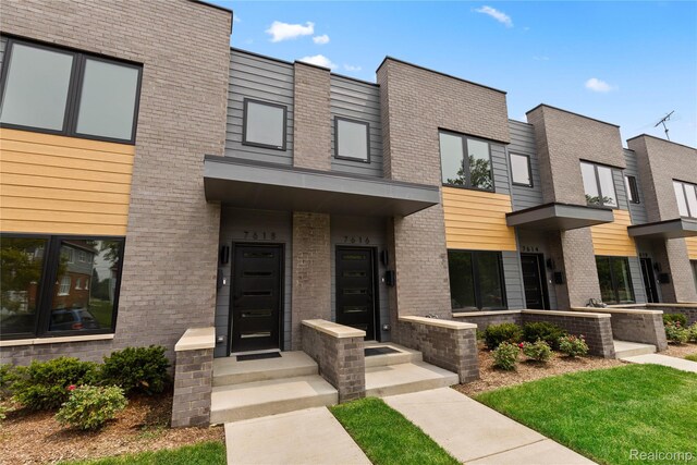 7614 Kipling Unit 15, Detroit, MI 48206 - view of front of home with brick siding
