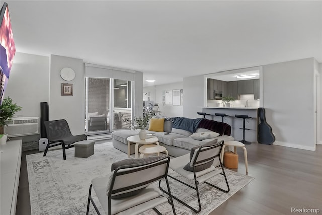 1050 Wall St Unit 8F, Ann Arbor, MI 48105 - living room featuring wood finished floors