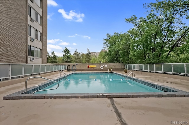 1050 Wall St Unit 8F, Ann Arbor, MI 48105 - community pool featuring a patio
