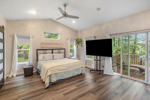 4958 Juniper Rdg, Newaygo, MI 49337 - bedroom with access to exterior, multiple windows, wood finished floors, and high vaulted ceiling