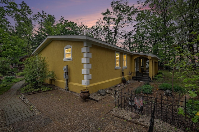 4958 Juniper Rdg, Newaygo, MI 49337 - view of property exterior featuring stucco siding