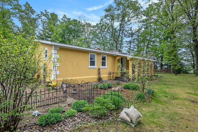4958 Juniper Rdg, Newaygo, MI 49337 - view of side of home with stucco siding
