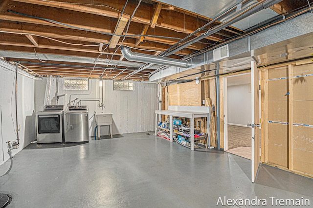 1046 Kenesaw Dr SE, East Grand Rapids, MI 49506 - basement featuring washer and clothes dryer and a sink