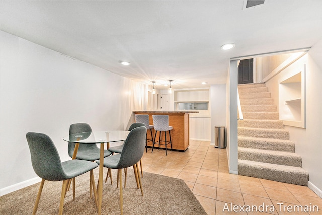 1046 Kenesaw Dr SE, East Grand Rapids, MI 49506 - dining space featuring stairway, light tile patterned floors, baseboards, and recessed lighting
