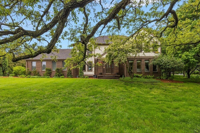 4047 Ramsgate Ct, Ann Arbor, MI 48103 - view of front of house with a front yard and brick siding