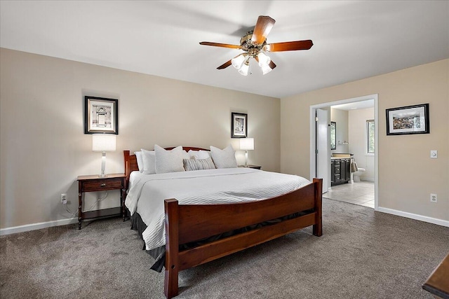 4047 Ramsgate Ct, Ann Arbor, MI 48103 - bedroom with carpet, baseboards, connected bathroom, and a ceiling fan