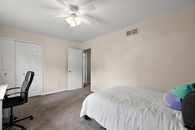 4047 Ramsgate Ct, Ann Arbor, MI 48103 - bedroom with dark colored carpet, a desk, a ceiling fan, baseboards, and a closet