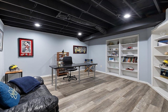 4047 Ramsgate Ct, Ann Arbor, MI 48103 - office area featuring wood finished floors, baseboards, and built in features