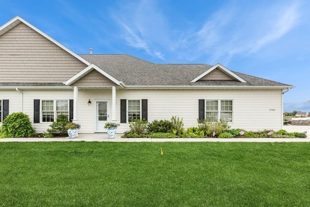 1732 Peachtree Path Unit 4, Stevensville, MI 49127 - view of front of home with a front lawn and roof with shingles