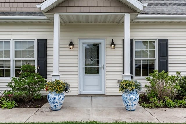 1732 Peachtree Path Unit 4, Stevensville, MI 49127 - property entrance featuring a shingled roof