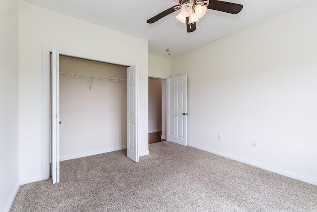 1732 Peachtree Path Unit 4, Stevensville, MI 49127 - unfurnished bedroom featuring carpet, a closet, a ceiling fan, and baseboards
