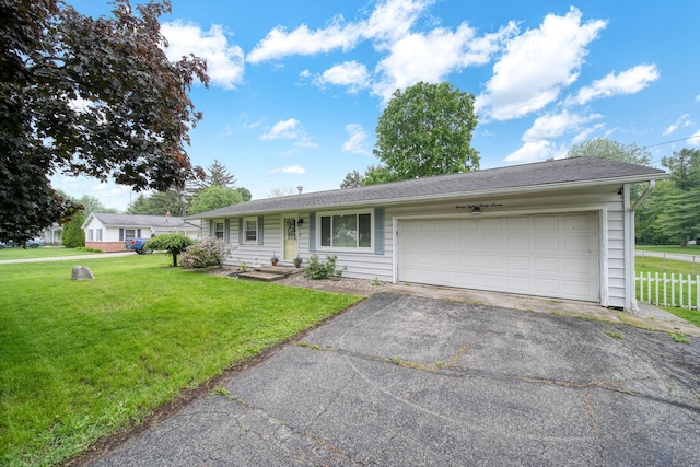 2837 Elmwood Dr, Adrian, MI 49221 - ranch-style house with driveway and an attached garage