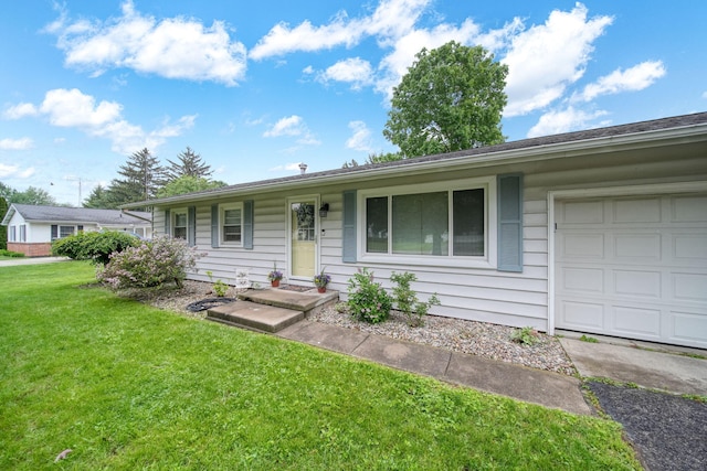 2837 Elmwood Dr, Adrian, MI 49221 - ranch-style home featuring a front yard and a garage
