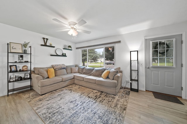 2837 Elmwood Dr, Adrian, MI 49221 - living room with a ceiling fan and light wood-type flooring