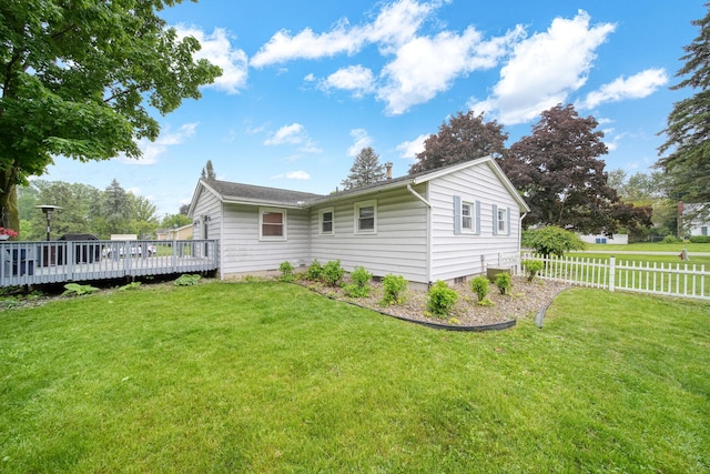2837 Elmwood Dr, Adrian, MI 49221 - back of property with a wooden deck