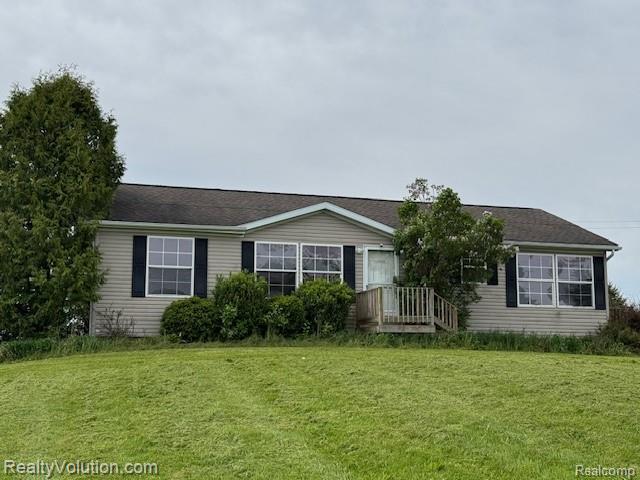 5736 Burnside Rd, North Branch, MI 48461 - view of front facade with a front yard