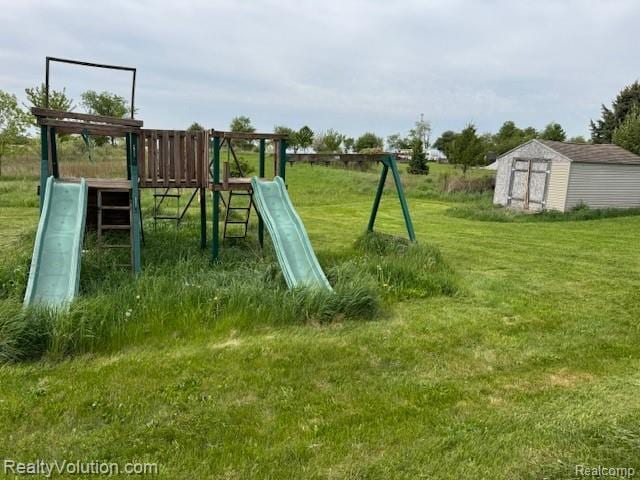 5736 Burnside Rd, North Branch, MI 48461 - view of jungle gym featuring a lawn