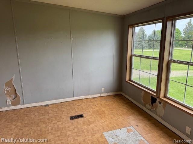 5736 Burnside Rd, North Branch, MI 48461 - unfurnished room with plenty of natural light and baseboards