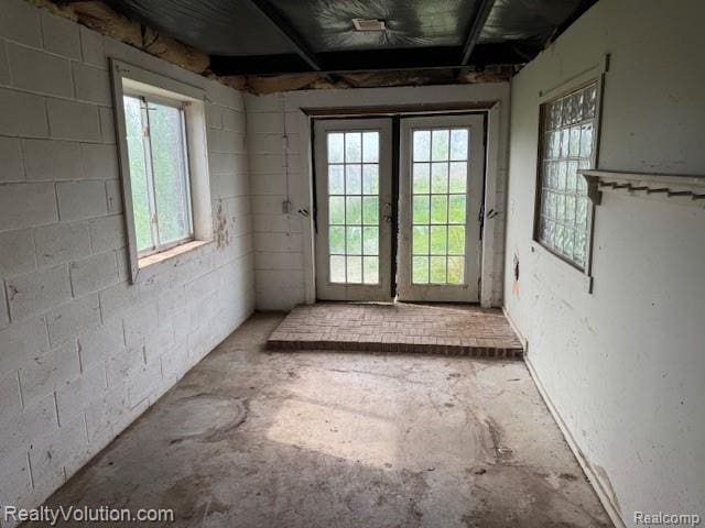 5736 Burnside Rd, North Branch, MI 48461 - entryway with unfinished concrete flooring and healthy amount of natural light