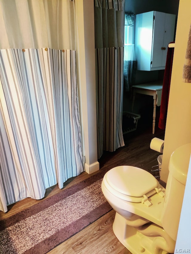 12765 Sand Creek Highway, Sand Creek, MI 49279 - bathroom featuring wood finished floors and toilet