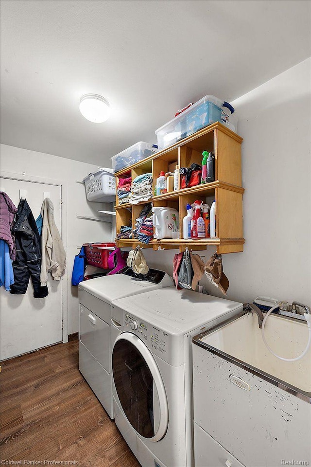 5240 Thomas Rd, Metamora, MI 48455 - laundry room featuring washing machine and clothes dryer and dark wood-style flooring